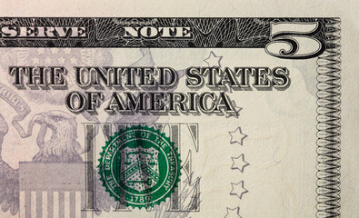 Obraz premium Details of a five dollar bill. Background