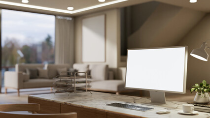 A computer with a white-screen mockup on a marble table in a modern, luxurious living room.