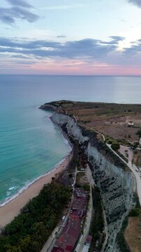 Sunset magic in Sicily: drone captures the tranquil beauty of mountains and sea. Heraclea Minoa. Sunset drone view, Sicily, Italy. 