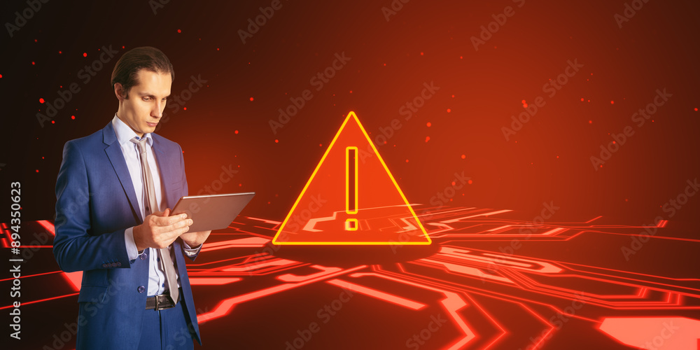 Poster side view of young businessman with tablet looking at red warning hologram on digital background. vi