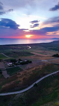 Experience Sicily's enchanting beauty with aerial views of mountains and sea at sunset. Heraclea Minoa. Sunset drone view, Sicily, Italy. 