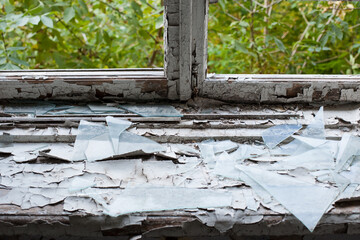 Smashed glass Window with old wooden frame. old window. finely broken glass. old house, retro....