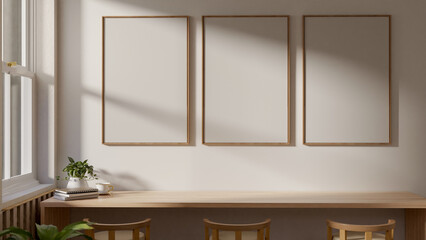 The interior design of a minimalist Scandinavian room features a long wooden table with stools.