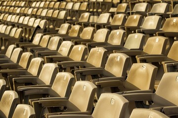 Obraz premium Empty snow-covered stands of the stadium. Beautiful simple AI generated image in 4K, unique.