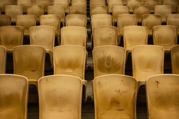 Obraz premium Empty stands and seats for fans and fans in the open-air stadium. Lack of fans during the pandemic.. Beautiful simple AI generated image in 4K, unique.