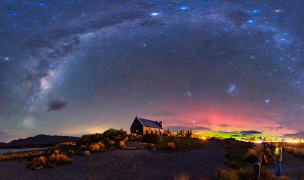 Milky Way, Nebula, Aurora Australis glowing over Church of the Good Shepherd at Lake Tekapo, New Zealand