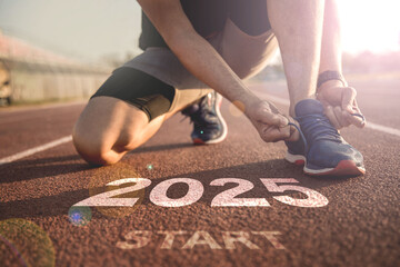 happy new year 2025,2025 symbolises the start into the new year.Start of people running on street,with sunset light.Goal of Success