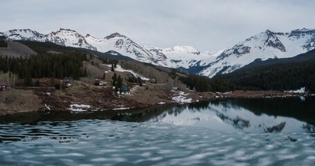 Trout Lake and snowy mountains at sunset, near Lizard Head Pass, Colorado, United States of America.