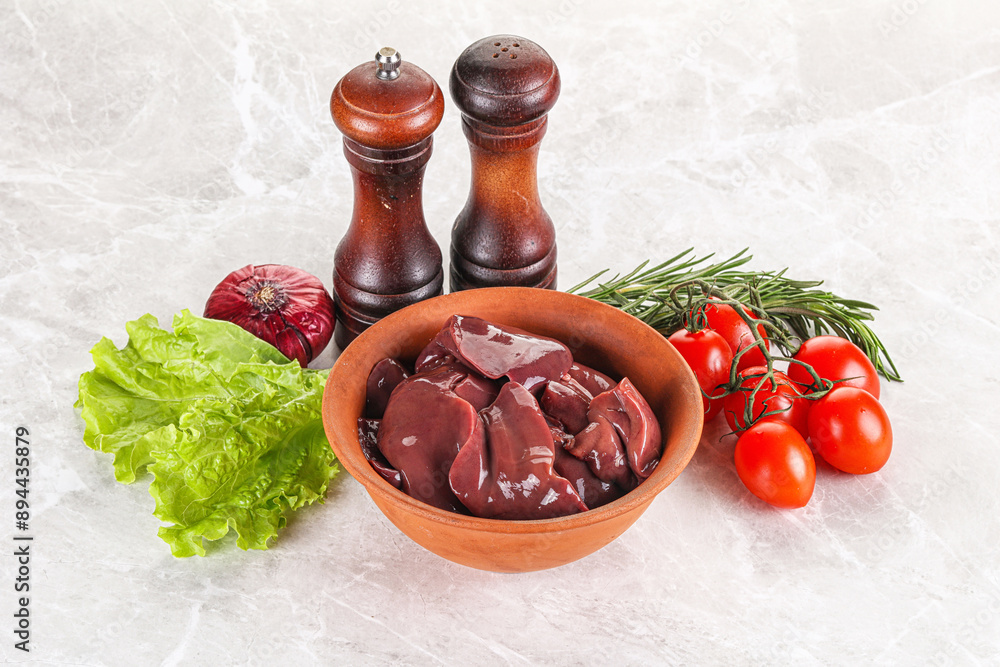 Wall mural Raw turkey liver in a bowl ready for cooking