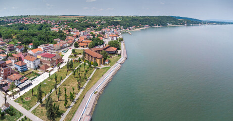 Aerial panorama of Golubac, showcasing the historic town's architecture and church by the Danube...