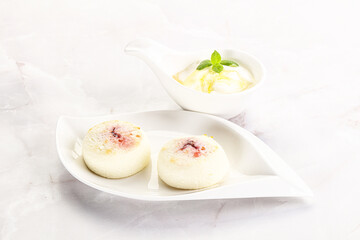 Curd pancakes with sour cream