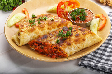 Mexican cuisine - chicken burrito with beans