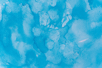 青色の水彩絵の具の背景