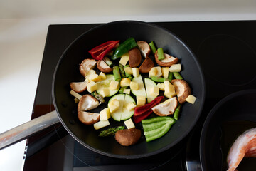 Frying pan cooking vegetables