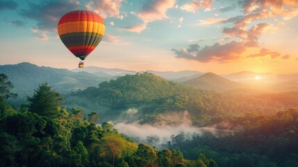 Fototapeta premium Hot air balloon in the sky above the forest landscape, place for nature travel