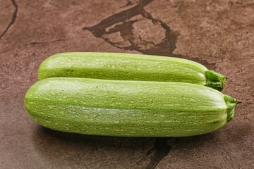 Raw green ripe zucchini vegetable