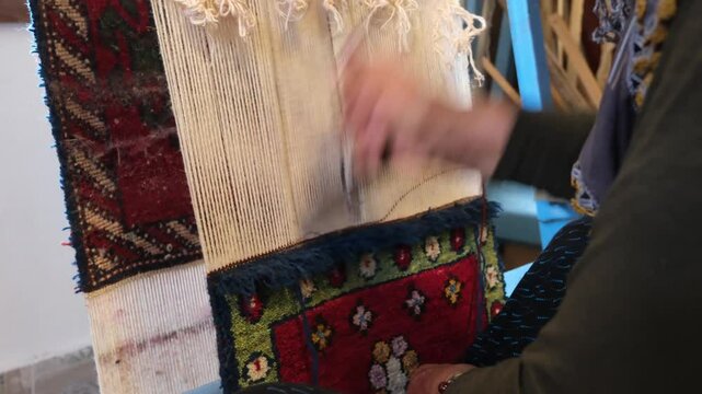 aunt knitting old carpets, woman making carpet