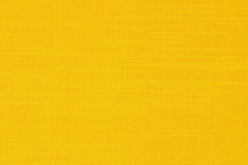Yellow linen fabric cloth texture background, seamless pattern of natural textile.