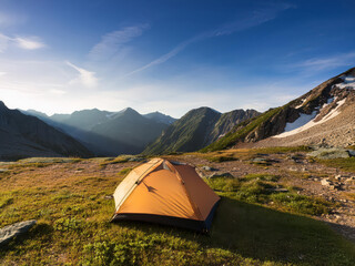 Photo of a tent in the mountain