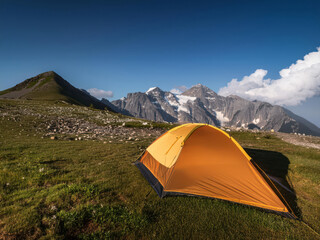 Photo of a tent in the mountain