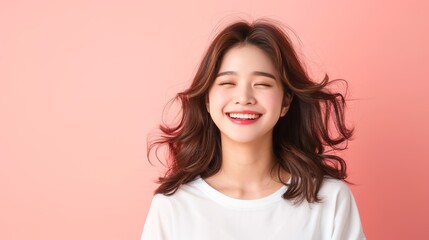 Fototapeta premium Happy Young Woman Smiling on Pink Background