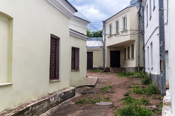 town background, provincial courtyard among old buildings