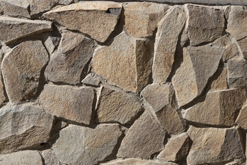 The texture of the wall decorated with decorative stone