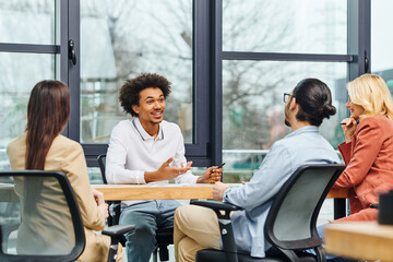 A diverse group of professionals discussing ideas and strategies at a meeting table.
