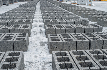 Concrete cinder blocks, building material in form of gray bricks. Use on the construction site.