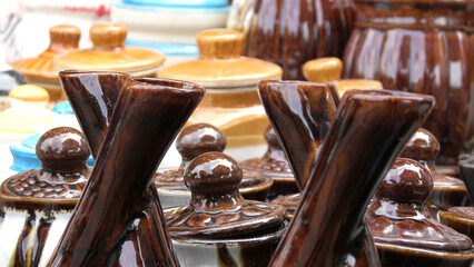Colorful ceramic crockery items displayed in a shop
