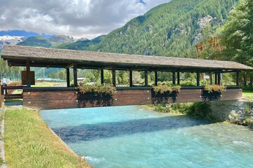 bridge and creek in champoluc, ayas, valle d'aosta, italy 