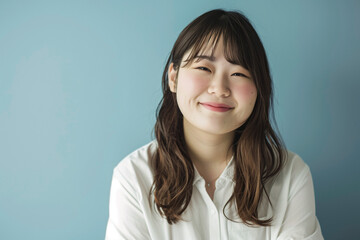 Fototapeta premium 笑顔の可愛い若いアジア人女性のポートレート写真