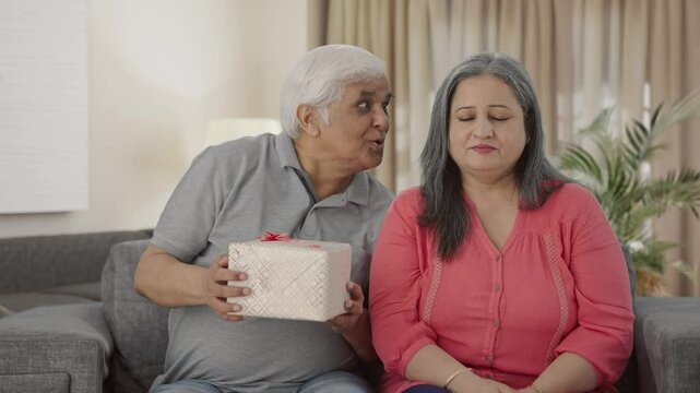 Old Indian husband surprises wife with a gift