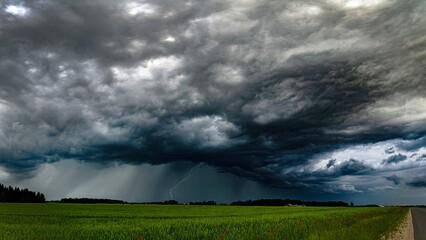 Dark Asperitas Clouds Make Sky in Black. Heavy Rain Thunderstorm. Pattern of Clouds Overcast Predict Tornado, Hurricane or Thunderstorm and Rain. Dark Sky Cloudy have Storm and Lightning Thunderbolt.