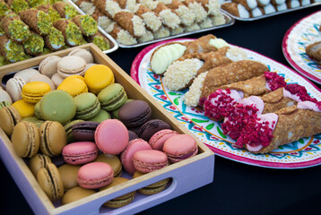 Macarons and other sweets at a street food market