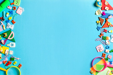 School supplies on blue background, used for Back to School advertising.