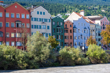 Colorful houses of Innsbruck in tyrol, austria at the river Inn