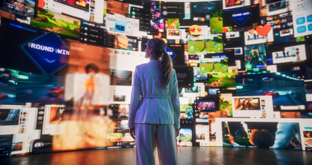 Backview Of Caucasian Woman Looking at Animated Stream Of Content. Visualization Of Browsing Metaverse Big Data with Viral Videos, Social Media Profiles with Influencers, Internet Communities.