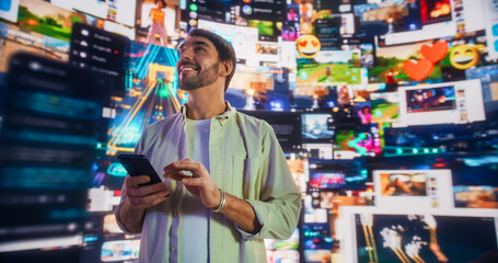 Obraz premium Portrait Of Caucasian Handsome Man Using Smartphone in 3D Cyberspace With Animated Social Media Interfaces, Video Games, Viral Videos, Internet Content. Visualization Of Blockchain Technology Concept.