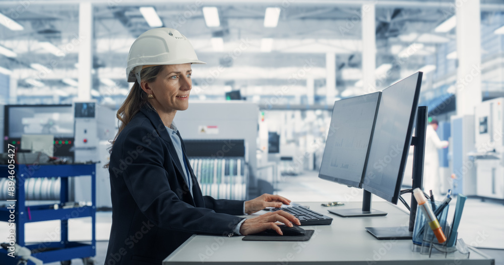 Poster Caucasian Female Industrial Engineer Developing Prototype of a Circuit Motherboard on a Desktop Computer In the Electronics Factory Office. Modern Technological Research and Development Center.