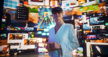 Portrait Of Caucasian Woman Wearing Augmented Reality Glasses And Gesturing To Surf Through Multimedia all in one Entertainment, TV, Videos, Video Games, Shopping. AR Interface Visualization.