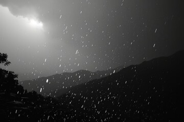 Naklejka premium Black and White Night Rain Over Serene Mountain Range