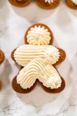 Creating Gingerbread Cookie Sandwiches with Buttercream Filling