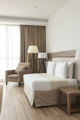 Modern hotel room interiors in neutral colors with a bed placed next to a large window. Commercial interior design composition.