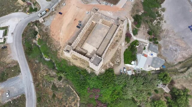 Aerial view of Venetian Castle of Frangokastello, in front of Lefka Ori Mountains (White Mountains), Chania region, Crete, Greek Islands, Greece