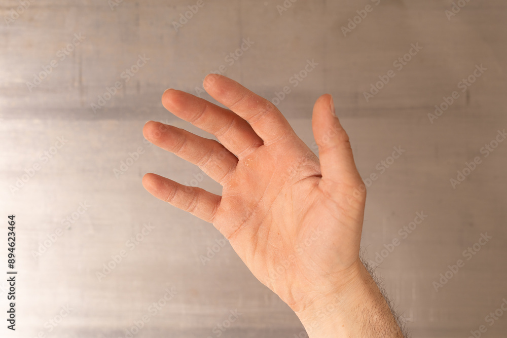 Poster an open hand reaches out towards the viewer