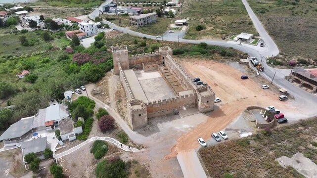 Aerial view of Venetian Castle of Frangokastello, in front of Lefka Ori Mountains (White Mountains), Chania region, Crete, Greek Islands, Greece