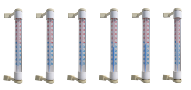 A thermometer that attaches to the window glass indicating cold temperatures. On isolated transparent background.
