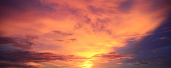 Banner Golden sky sunrise dramatic beautiful landscape view. Dawn sky gold dusk time cloudscape with sunlight. Panorama Dramatic sunset scenic landscape. Beautiful landscape nature with copy space