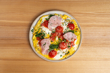 Omelette with Ham, Tomatoes, Cheese and Greens